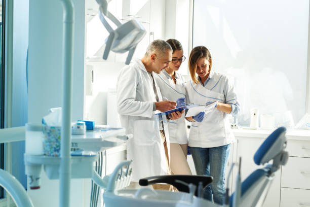 istock Medical dentist team in dental office 939141776