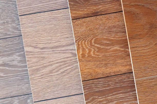 istock Diagonal wooden laminate floor examples top view. 939148950