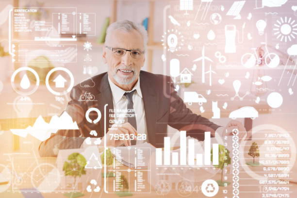 istock Optimistic man smiling and feeling good while being in his office 939155470