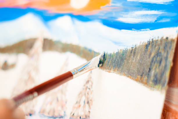 istock the artist paints with oil 939155568