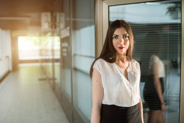 Business woman while working in her office