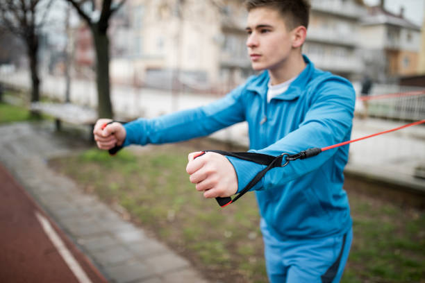istock Young man exercising in the outdoors 939159556