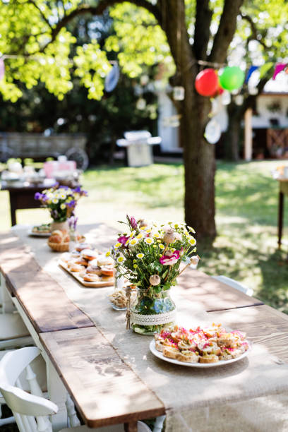 istock Table set for a garden party or celebration outside. 939163346