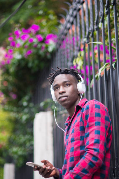 istock African teenager using mobile phone 939167892