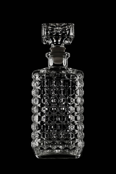 istock Whiskey carafe in glass on black background 939168162