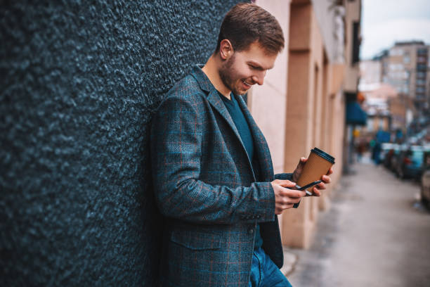 istock Handsome businessman in the city 939168370