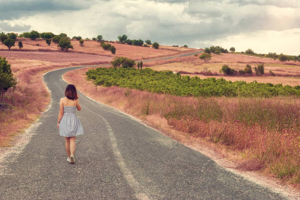 istock A beautiful girl on the road 939168720