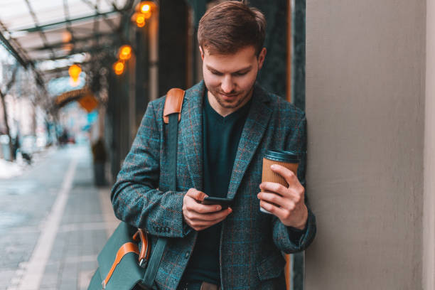 istock Handsome businessman in the city 939169358