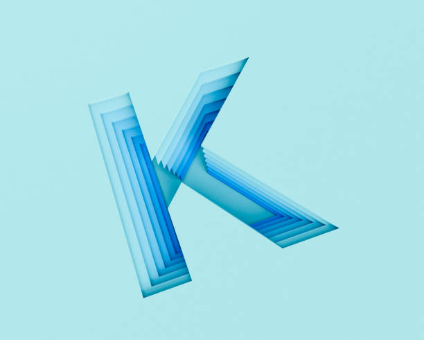 istock 3d rendered layer carved upper case K in blue tones. 939172722