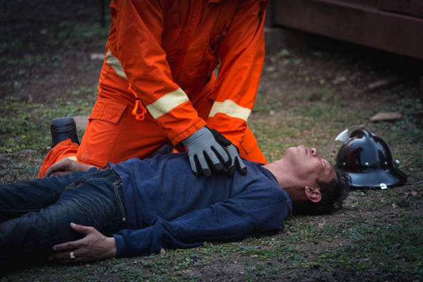 istock Firefighters training, Team practice to fighting with fire in emergency situation. A fireman resuscitate a casualty 939173312