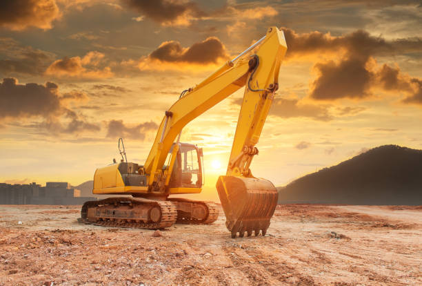 istock Heavy earth mover with blue sky in the background 939185750