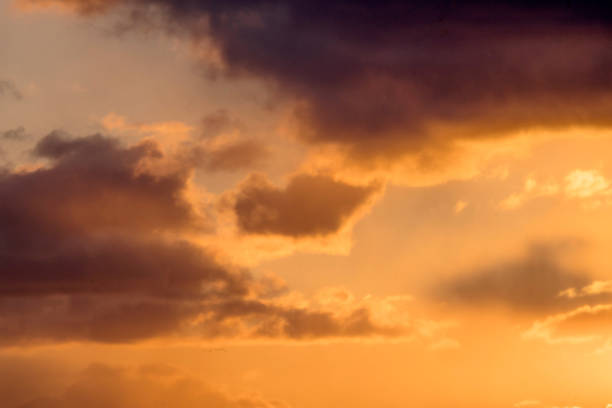 istock Colorful sunset with fluffy clouds in the sky 939185786