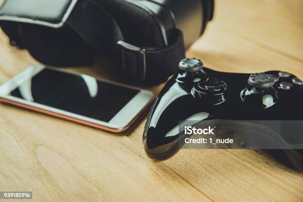 Gamepad On Wood Board Stock Photo - Download Image Now - Pawn - Chess Piece, Smart Phone, Video Game