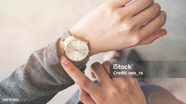 Woman Looking Her Watch Stand Up Stock Photo - Download Image Now - Checking the Time, Watch - Timepiece, Clock