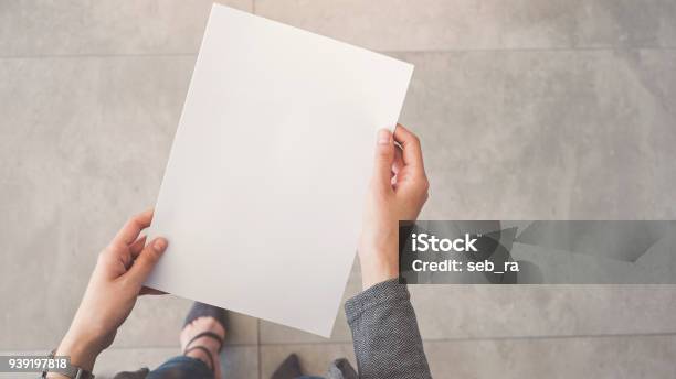 Person Holding White Empty Paper Stock Photo - Download Image Now - Paper, Template, Brochure