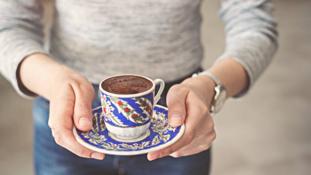 istock Woman serving a cup of Turkish coffee 939199084