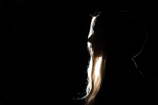Woman In Darkness