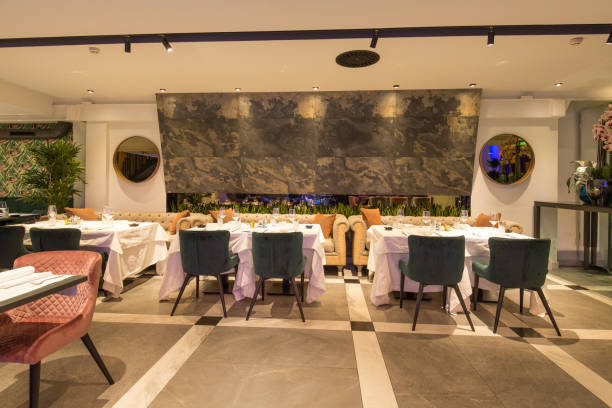 istock Interior of a new luxury restaurant in the evening 939217448