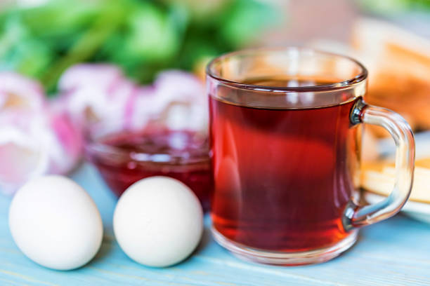 istock Breakfast with tea, jam and flowers 939218946