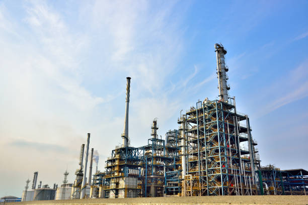 istock Oil refinery plant against blue sky 939219218
