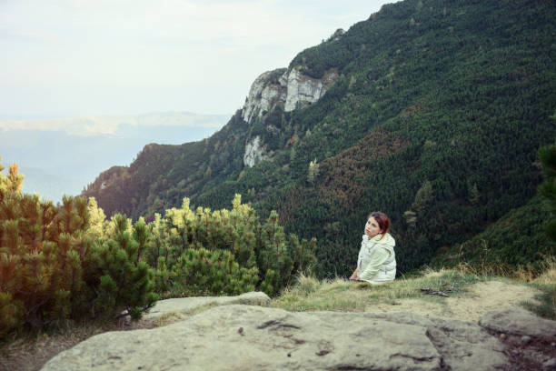 istock Smiling Young Woman on a Hiking Trail 939219898