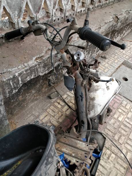 istock Rusted old motorcycle on the ground 939220098