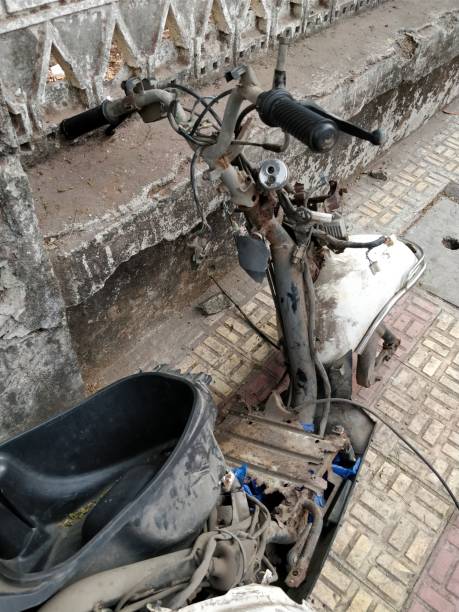 istock Rusted old motorcycle on the ground 939220326