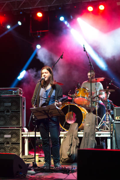 istock Rock band performing on the live concert 939222796