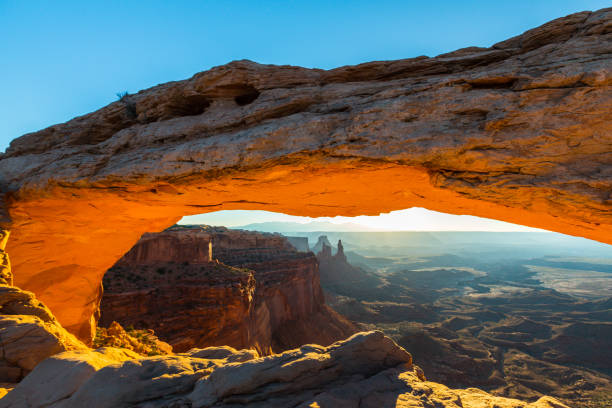 istock Scenery in the Arches National Park, Utah, with Mesa Arch under warm sunrise light 939223602