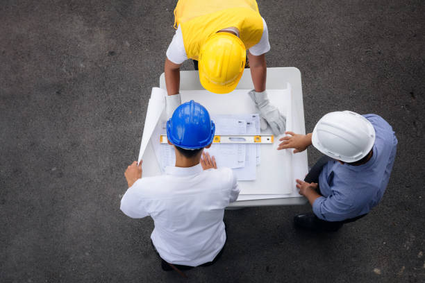 istock Top view of engineer team checkig blueprint 939223656