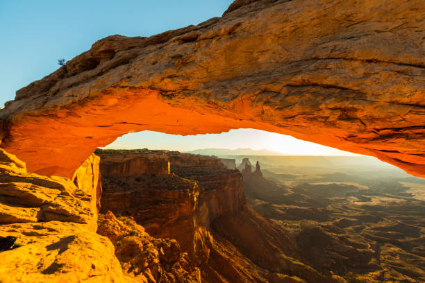 istock Scenery in the Arches National Park, Utah, with Mesa Arch under warm sunrise light 939223664