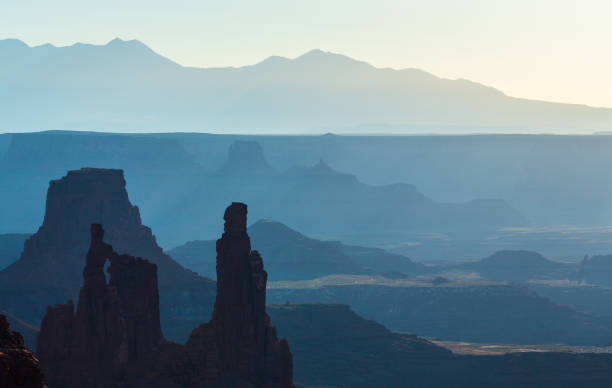 istock Scenery in the Arches National Park, Utah, with Mesa Arch under warm sunrise light 939224016