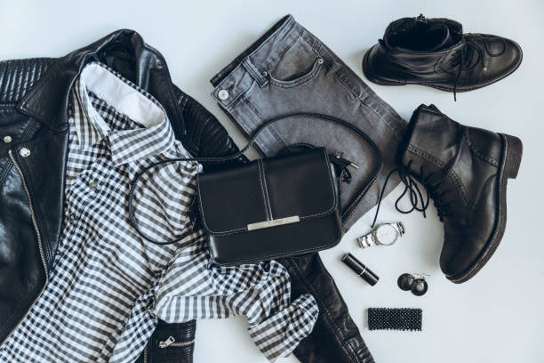 istock woman clothes flat lay. overhead view. black white concept 939224170