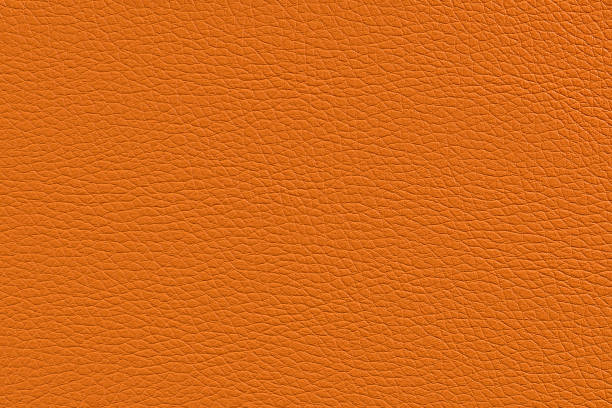 istock background of natural leather - texture - pattern Orange 939235794