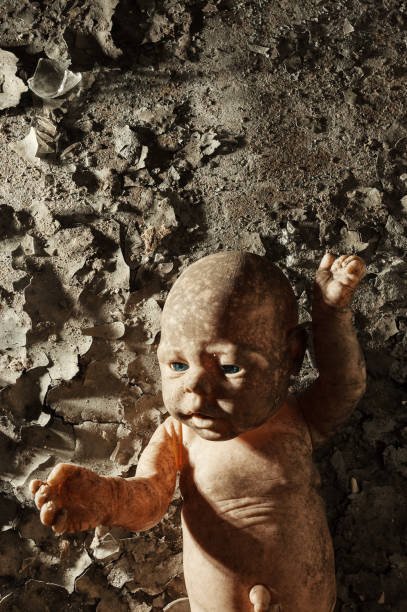 istock Creepy Baby Doll 939238660
