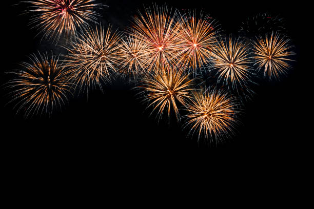 istock Colored firework background with free space for text. Colorful fireworks at night light up the sky with dazzling display. Use for abstract background. 939238748
