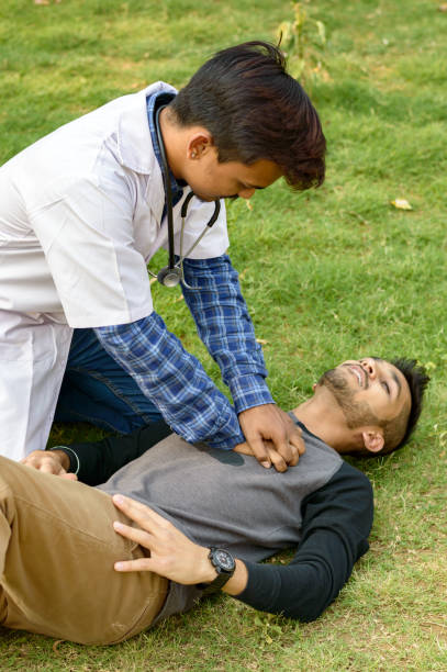 istock Indian male doctor examining patient. 939239348