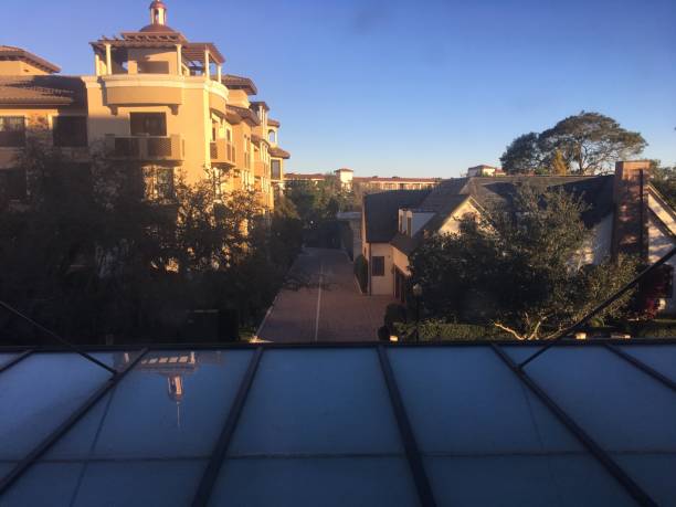Good morning Winter Park FL view from alfond inn, winter park, fl. beautiful morning. reflections, neighborhood, blue sky. winter park florida stock pictures, royalty-free photos & images