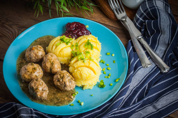 istock Meatballs with potatoes in dill sauce. 939254674
