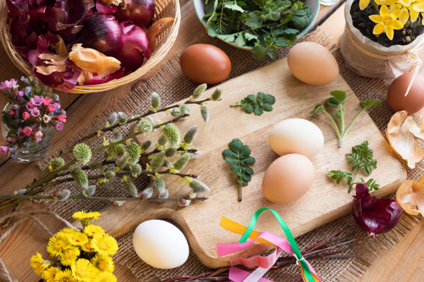 istock Preparation of Easter eggs for dying with onion peels 939255574