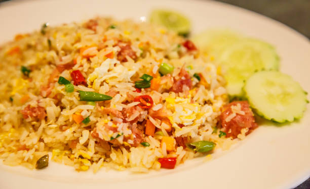 istock selective focused closeup asian thai cuisine dish menu: thai fermented pork fried rice 939268362