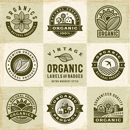 A set of vintage organic labels and badges in retro woodcut style. Editable EPS10 vector illustration with clipping mask and transparency.