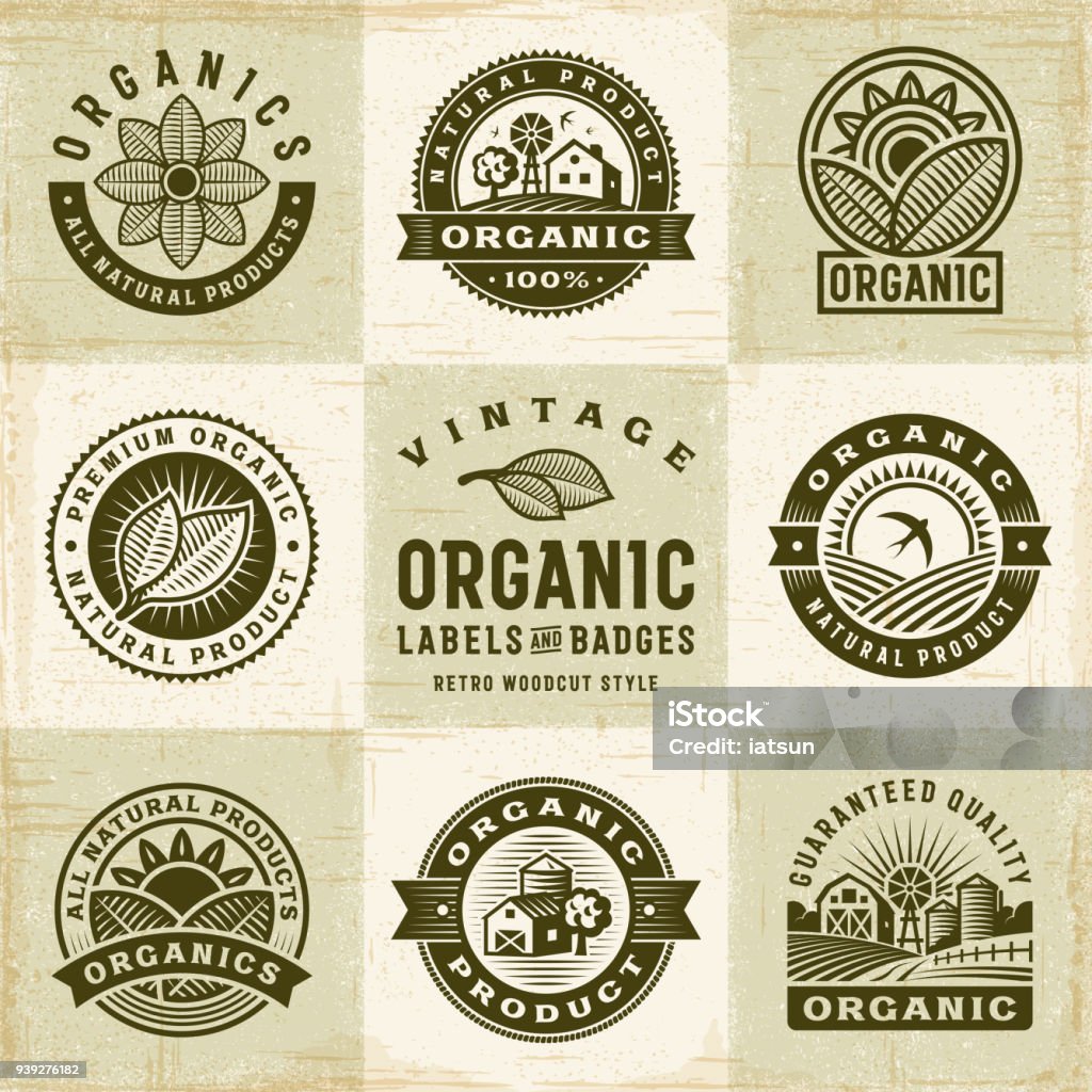 Vintage Organic Labels And Badges Set A set of vintage organic labels and badges in retro woodcut style. Editable EPS10 vector illustration with clipping mask and transparency. Logo stock vector