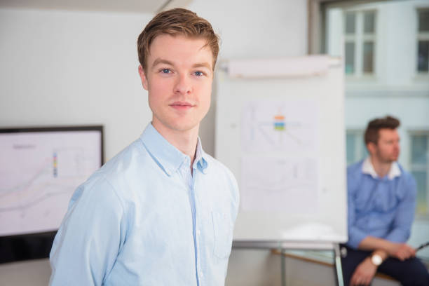 istock Confident Male Professional Standing In Office 939277714