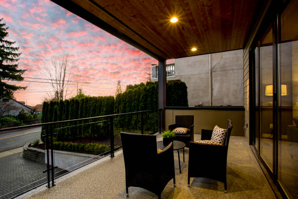 istock Modern house exterior with a deck at sunset. 939284608