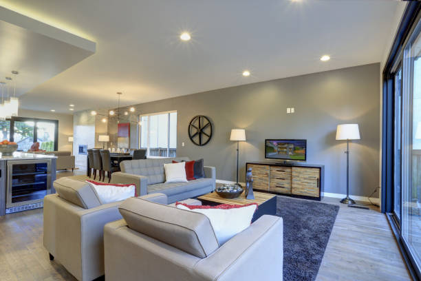 istock White and gray Living room interior with exit to a deck. 939284692