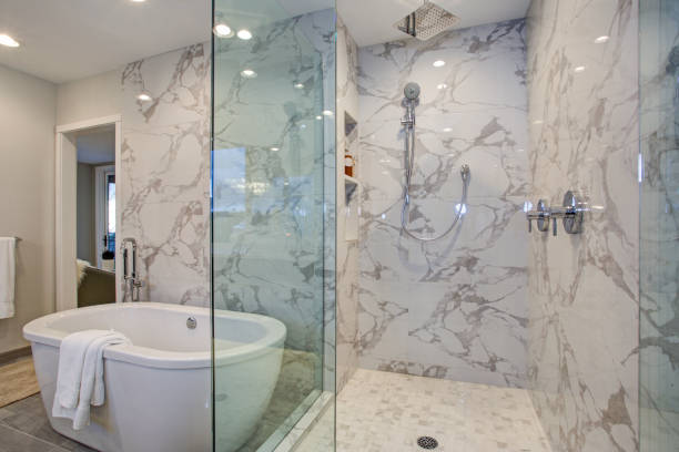 White and gray calcutta marble bathroom design stock photo