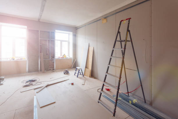 istock Interior of apartment  during construction, remodeling, renovation, extension, restoration and reconstruction - ladder and construction materials in the room 939287728