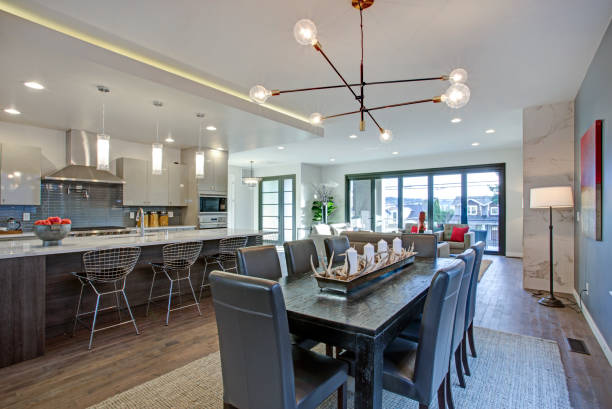istock Sleek modern kitchen design with a long center island. 939287892