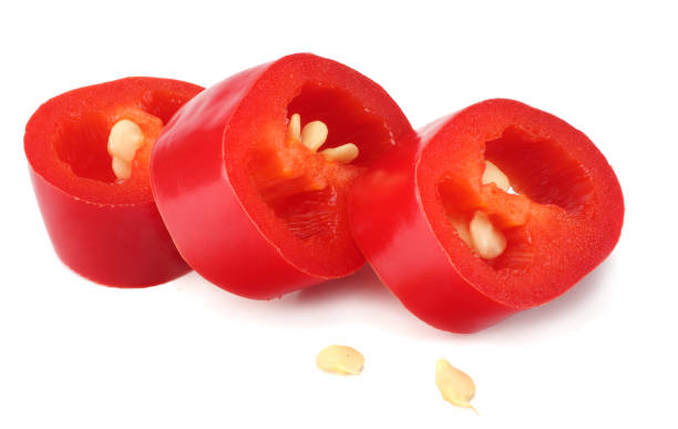 istock sliced red hot chili peppers isolated on white background 939290578
